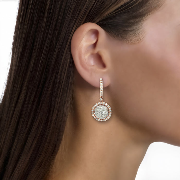 Near Colorless Diamond Globe Drop Earrings (2 ⅘ ct. tw.) in 14k Rose Gold shown on the ear (medium skin tone)