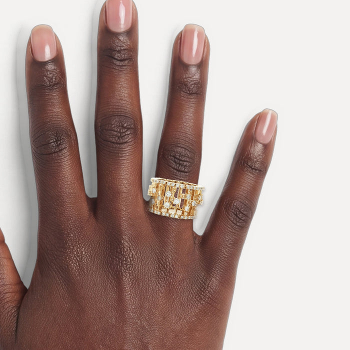 Round Brilliant Cut Nearly Flawless Colorless Diamond Birdcage Eternity Ring (1 ⅔ ct.) in 14k Yellow Gold shown on a hand (deep skin tone)