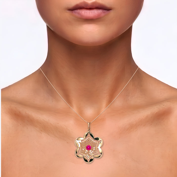 Filigree Vivid Ruby Flower Pendant Necklace (⅗ ct.) in 14k Rose Gold shown on the neck (medium skin tone)