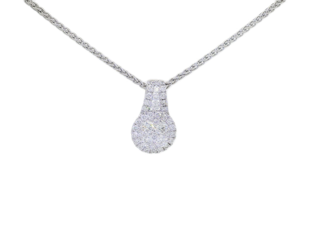 A teardrop-shaped diamond pendant necklace in 18KT white gold, featuring a pave setting with sparkling stones.