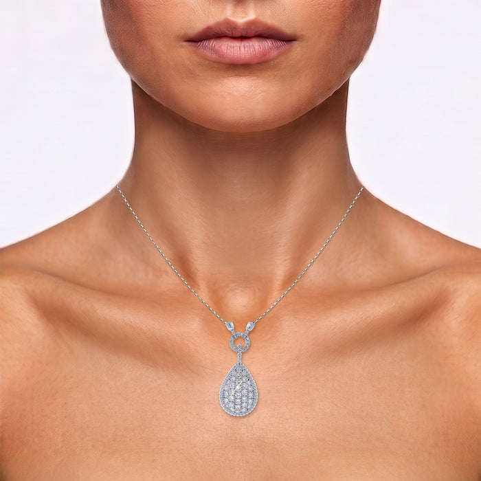 Teardrop Colorless & Nearly Flawless Diamond Cluster Pendant Necklace (3 ½ ct. tw.) in 14k White Gold shown on the neck (medium skin tone)