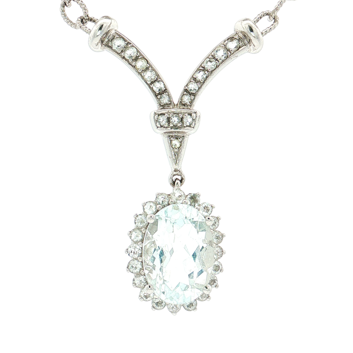 Oval Sky Blue Topaz Cubic Zirconia Halo Pendant Necklace (7 ct.) in Sterling Silver