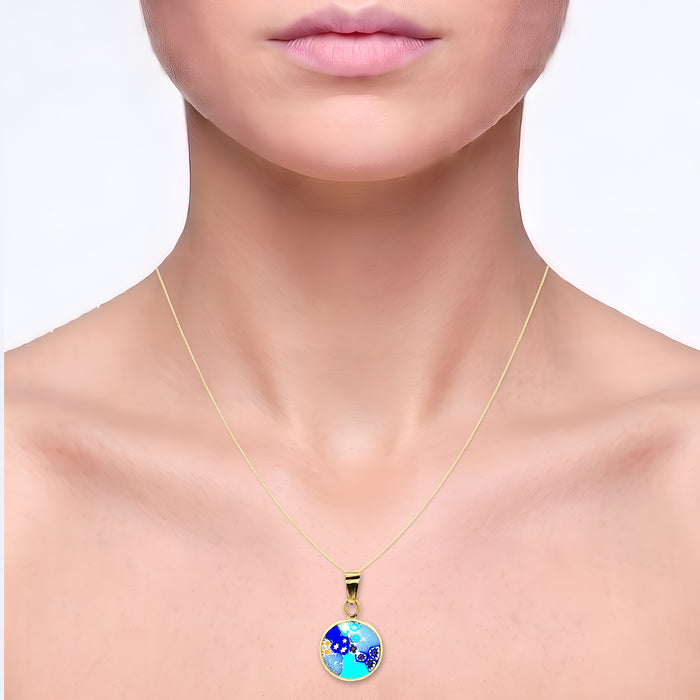 Italian Murano Millefiori Glass Pendant Necklace in 18k Yellow Gold shown on the neck (light skin tone)
