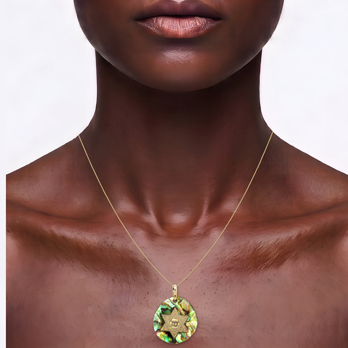 14k Gold Star of David Mother of Pearl Pendant Necklace in 14k Yellow Gold shown on the neck (deep skin tone)