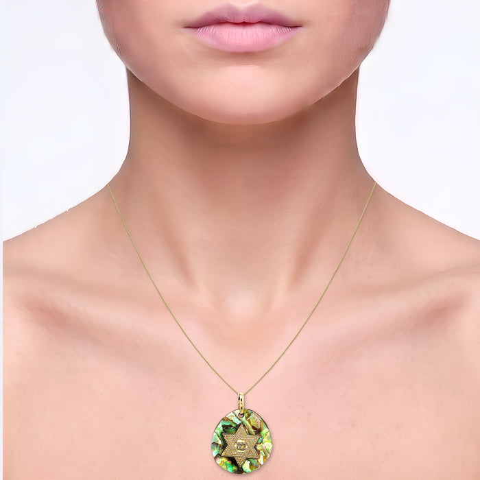 14k Gold Star of David Mother of Pearl Pendant Necklace in 14k Yellow Gold shown on the neck (light skin tone)