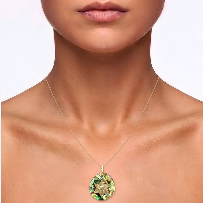 14k Gold Star of David Mother of Pearl Pendant Necklace in 14k Yellow Gold shown on the neck (medium skin tone)