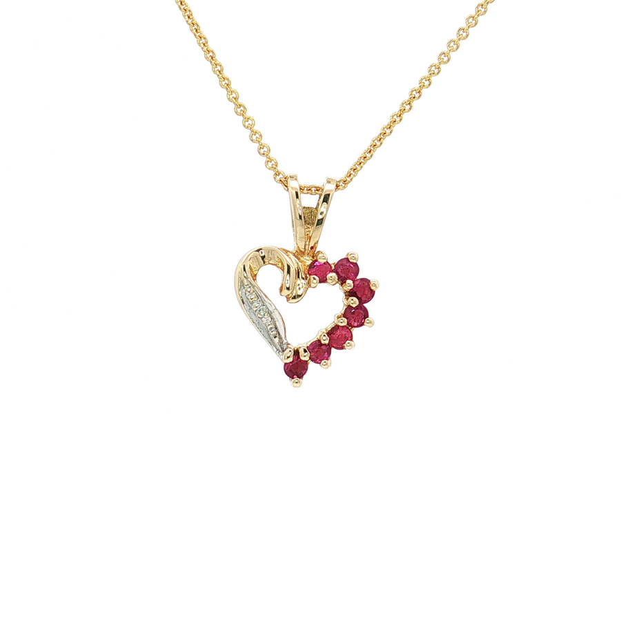 A gold heart-shaped pendant necklace featuring a curved gold swan motif on one side, a row of small clear stones on the other, and a border of red gemstones, shown on a white background.