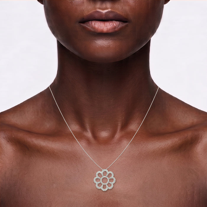 Pavé Colorless Nearly Flawless Diamond Flower Pendant Necklace (1 ¼ ct. tw.) in 18k White Gold shown on the neck (deep skin tone)