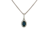 Oval Deep Blue Sapphire Colorless Nearly Flawless Halo Diamond Pendant Necklace (⅔ ct. tw.) in 18k White Gold