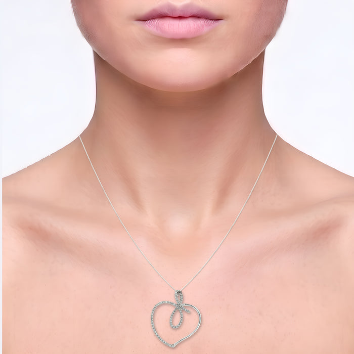 Round Brilliant Cut Colorless Near Flawless Diamond Pendant Necklace (¾ ct. tw.) in 18k White Gold shown on the neck (light skin tone)