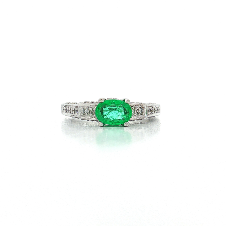 Oval Cut Emerald & Pavé Diamond Ring (1 ⅓ ct. tw.) in 18k White Gold