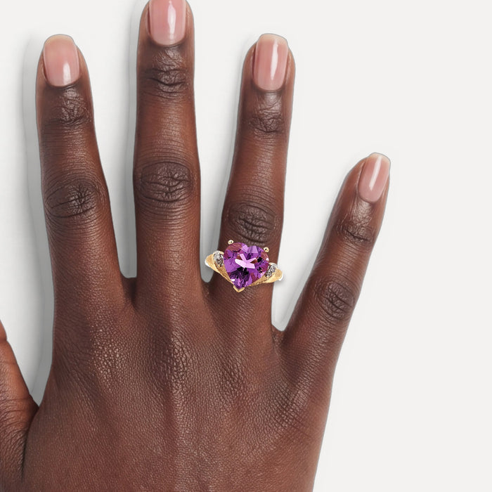 Heart Shape Amethyst & Diamond Ring (3 ¼ ct. tw.) in 10k Yellow Gold shown on a hand (deep skin tone)