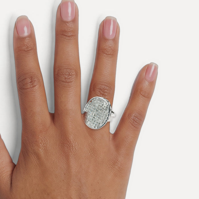 Certified Colorless Invisibly Set Princess Cut Diamond Cluster Ring (8 ½ ct. tw.) in 14k White Gold shown on a hand (medium deep skin tone)
