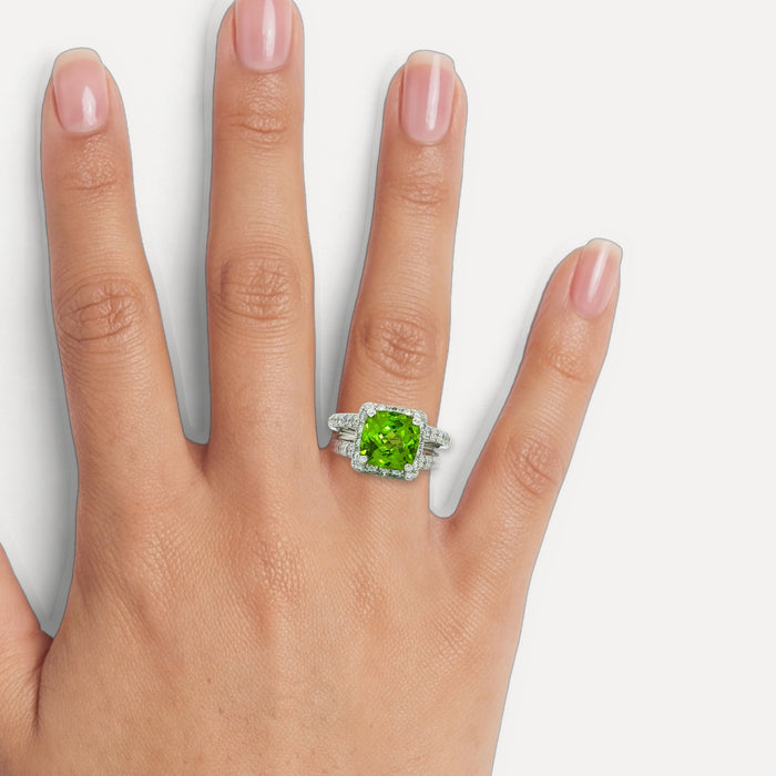 Cushion Vivid Peridot Diamond Halo Ring (4 ½ ct. tw.) in 18k White Gold shown on a hand (medium skin tone)