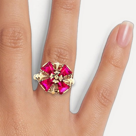 vintage-flower-vivid-ruby-ring-1-1-2-ct-tw-in-10k-yellow-gol shown on hand