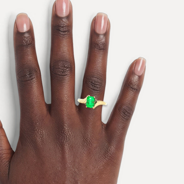 Emerald & Diamond Ring (1 ⅛ ct. tw.) in 14k Yellow Gold shown on a hand (deep skin tone)