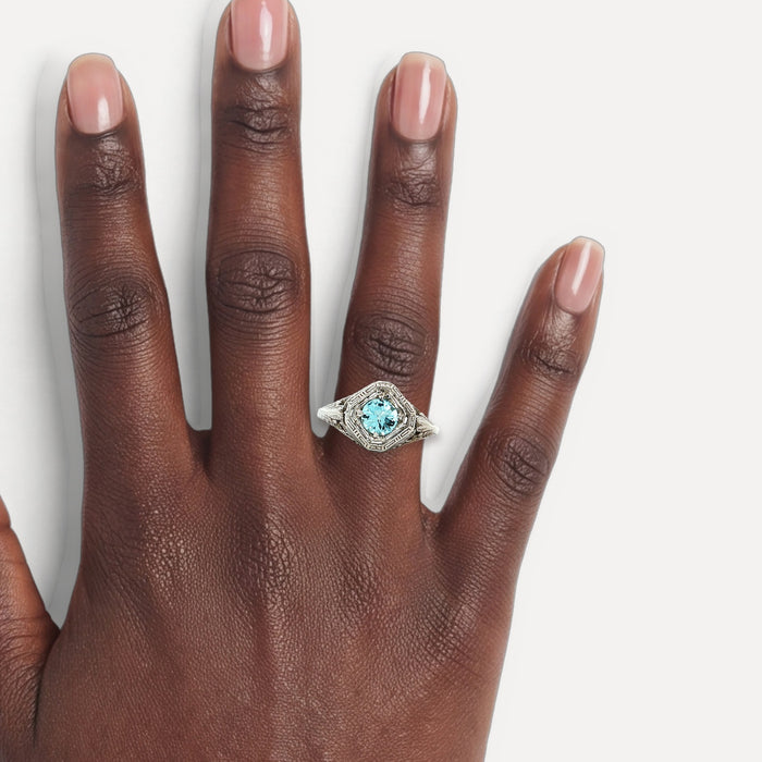 Victorian Vintage Aquamarine Ring (1 ¼ ct.) in 14k White Gold shown on a hand (deep skin tone)