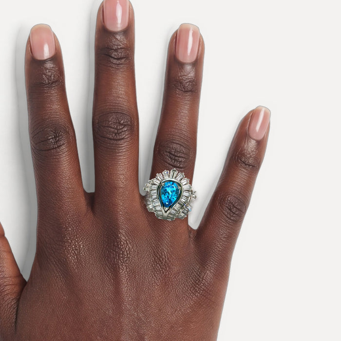 London Blue Topaz & Nearly Flawless Colorless Diamond Ring (3 ⅞ ct.) in Platinum shown on a hand (deep skin tone)