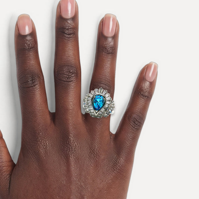 London Blue Topaz & Nearly Flawless Colorless Diamond Ring (3 ⅞ ct.) in Platinum shown on a hand (deep skin tone)