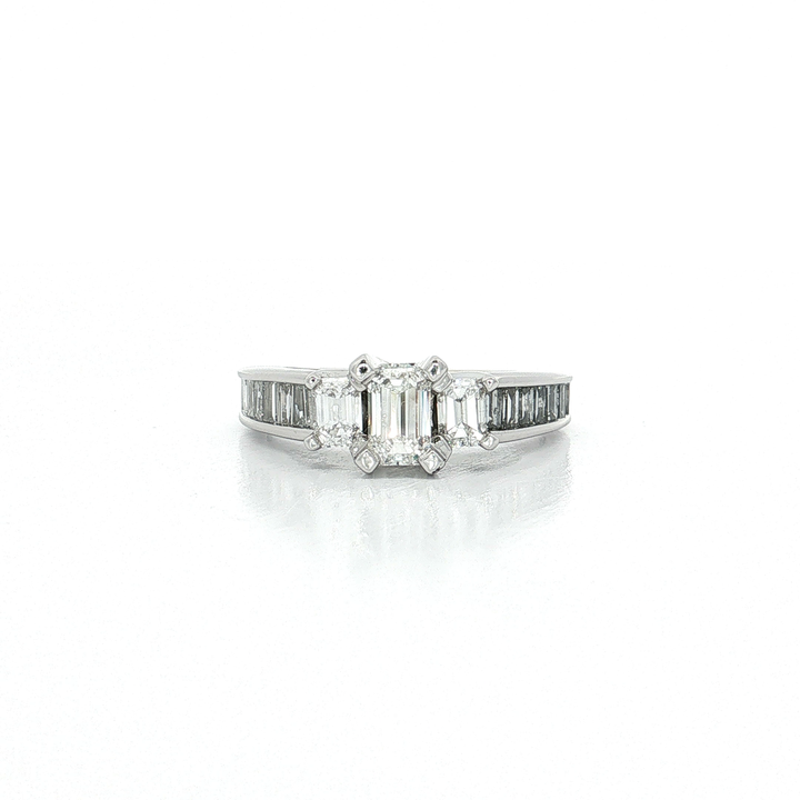 Colorless & Near Flawless Emerald-Cut Diamond Three-Stone Ring with Channel-Set Baguette Shoulders (1 ½ ct. tw.) in 14k White Gold
