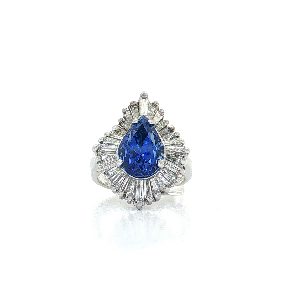 GIA Certified Pear Sapphire Colorless Diamond Ballerina Ring in 14k White Gold with brilliant tapered baguette diamonds.