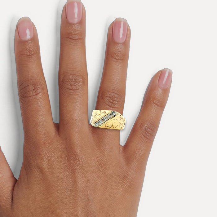 Near-Colorless Diamond Cigar Band Ring (¼ ct. tw.) in 14k Yellow Gold shown on a hand (medium deep skin tone)