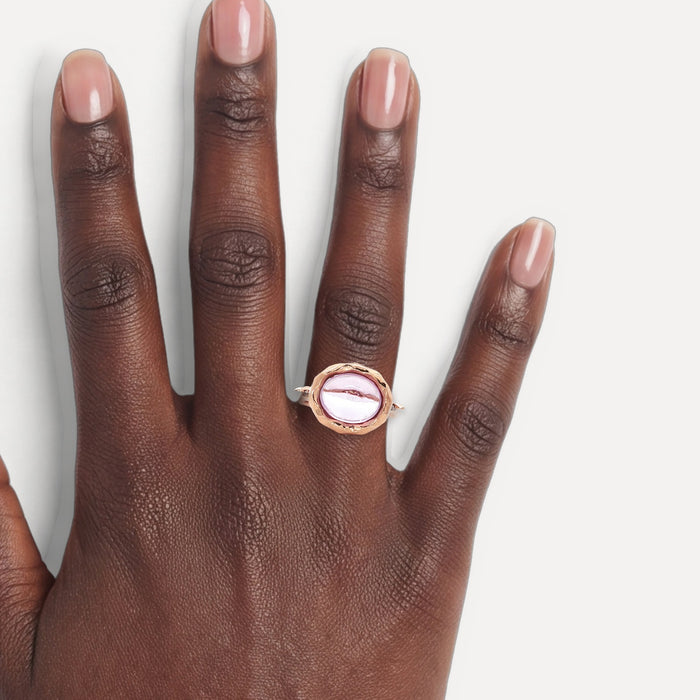 Cabochon Oval Morganite & Round Brilliant Cut Diamond Ring (3 ct. tw.) in 14k Rose Gold shown on a hand (deep skin tone)