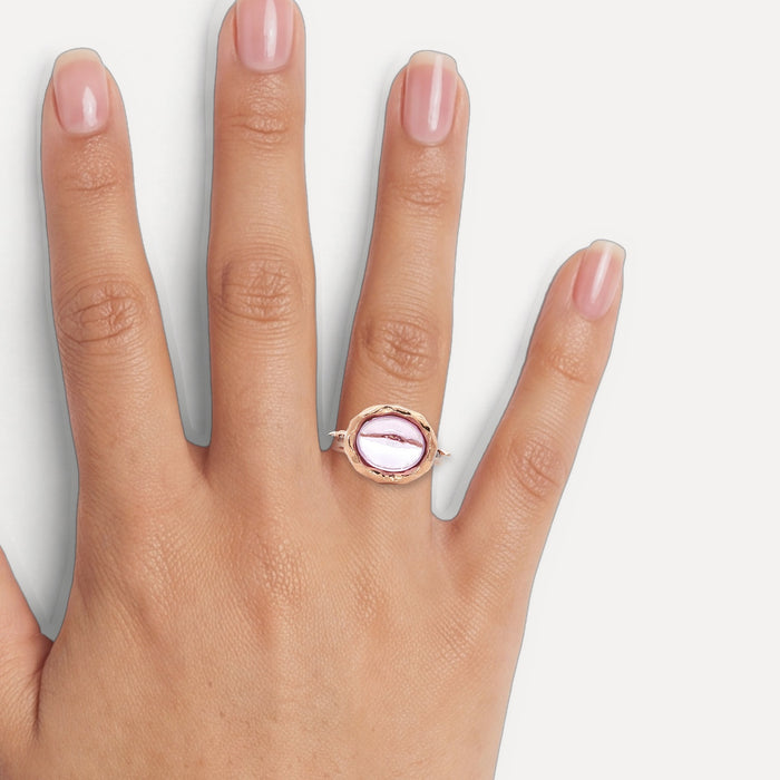 Cabochon Oval Morganite & Round Brilliant Cut Diamond Ring (3 ct. tw.) in 14k Rose Gold shown on a hand (medium skin tone)