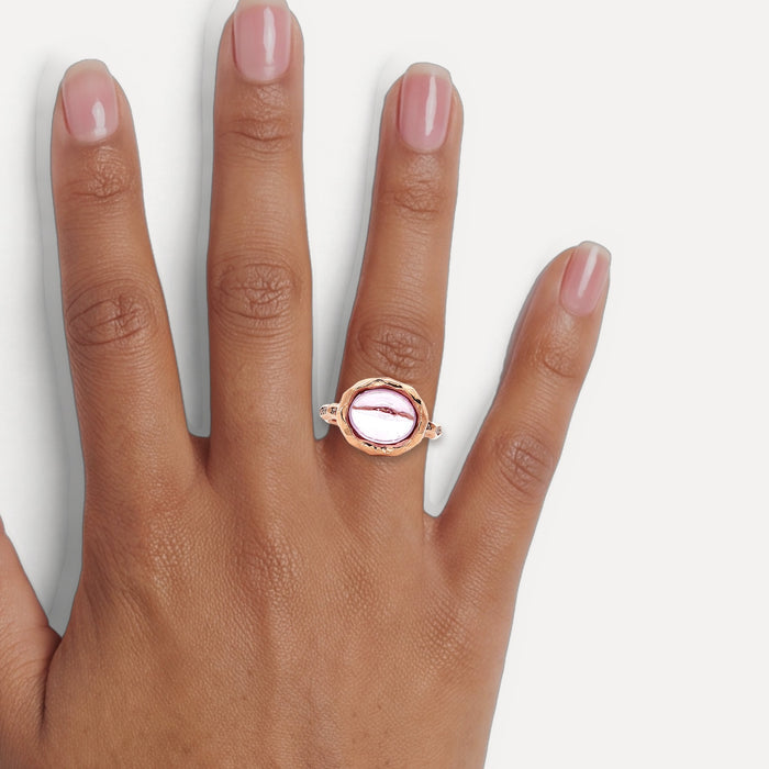 Cabochon Oval Morganite & Round Brilliant Cut Diamond Ring (3 ct. tw.) in 14k Rose Gold shown on a hand (medium deep skin tone)