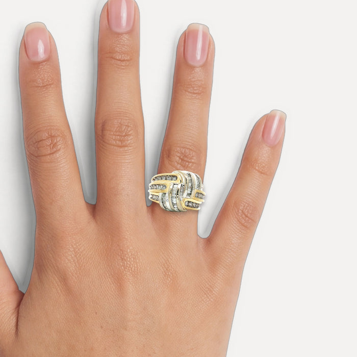 Vintage Round Brilliant Cut & Baguette Diamond Knot Ring (1 ¼ ct. tw.) with a Channel-Set Overlapping Weave Design in 14k Yellow & White Gold shown on a hand (medium skin tone)