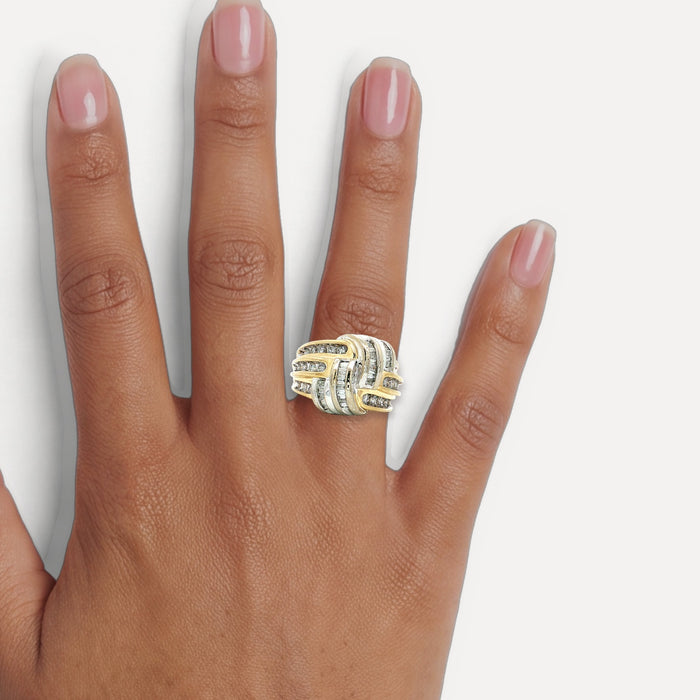 Vintage Round Brilliant Cut & Baguette Diamond Knot Ring (1 ¼ ct. tw.) with a Channel-Set Overlapping Weave Design in 14k Yellow & White Gold shown on a hand (medium deep skin tone)