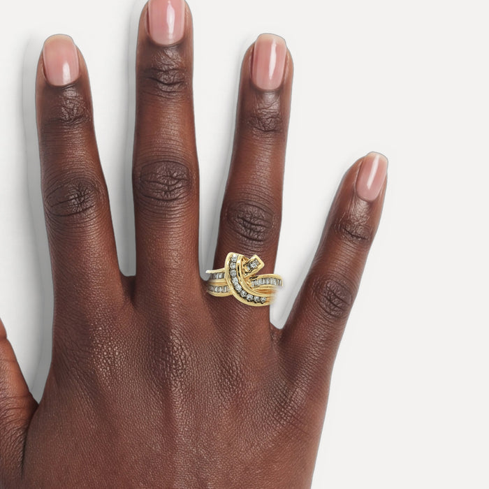 Round Brilliant & Baguette Diamond Bypass Ring (1 ct. tw.) in 14k Yellow Gold shown on a hand (deep skin tone)