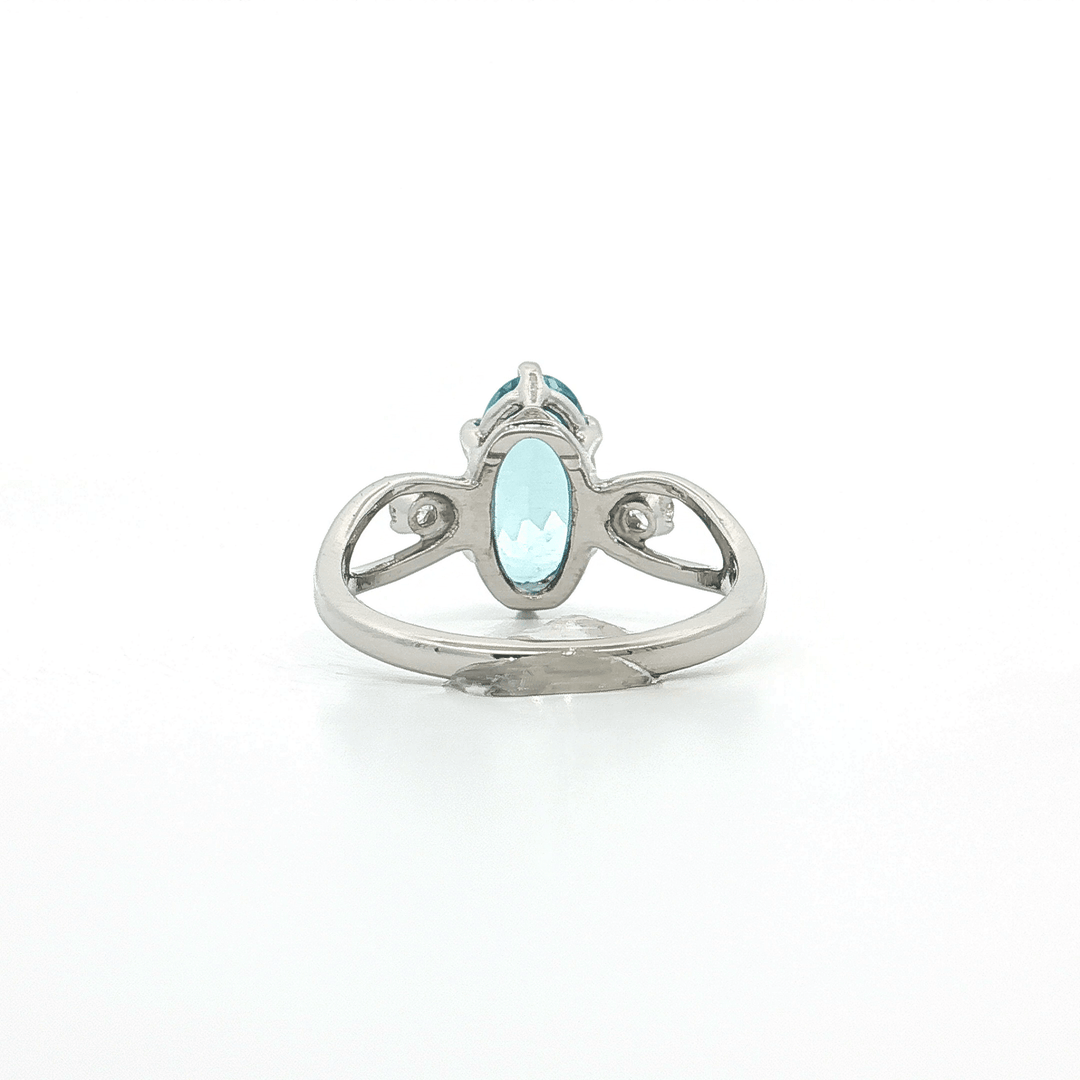 2.20 CTW AAAA - Grade Sky Blue Oval Cut Topaz & Colorless Near Flawless Natural Round Brilliant Cut Diamonds in a 14kt White Gold Ring – Jewelry Depot, Inc.