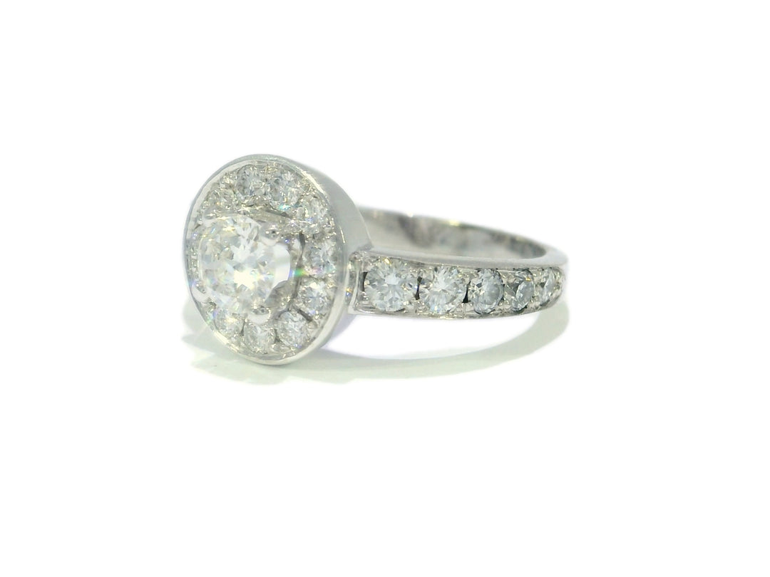 1.12 CTW Colorless Round Brilliant Cut Halo Diamond Engagement Ring in 18KT White Gold