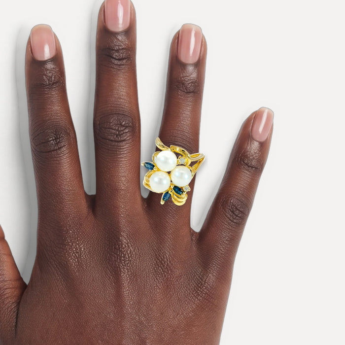 Pearl, Sapphire & Diamond Cocktail Ring (⅜ ct. tw.) in 14k Yellow Gold shown on a hand (deep skin tone)