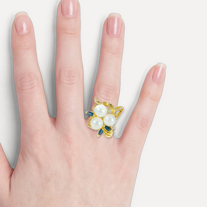 Pearl, Sapphire & Diamond Cocktail Ring (⅜ ct. tw.) in 14k Yellow Gold shown on a hand (light skin tone)