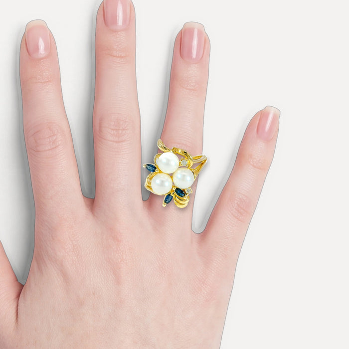 Pearl, Sapphire & Diamond Cocktail Ring (⅜ ct. tw.) in 14k Yellow Gold shown on a hand (light skin tone)