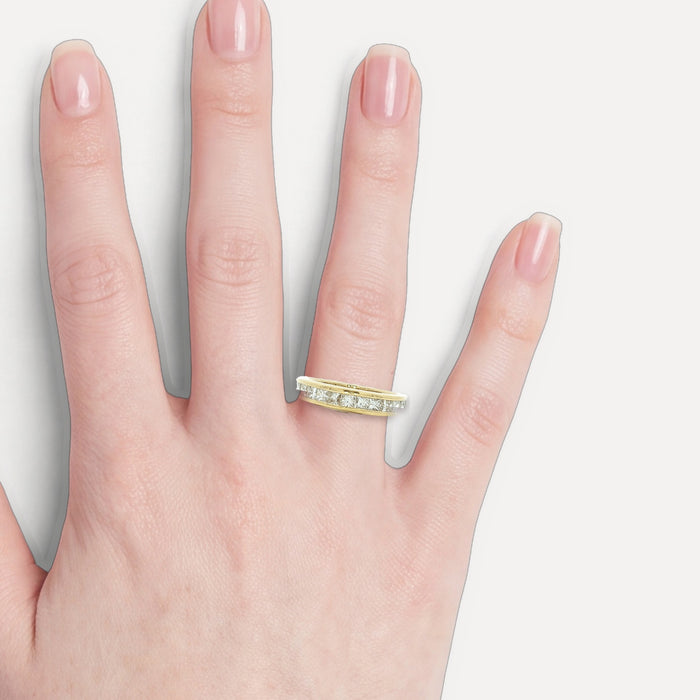 Colorless Princess Brilliant Cut Diamond Channel-Set Wedding Band (1 ct.) in 14k Yellow Gold shown on a hand (light skin tone)