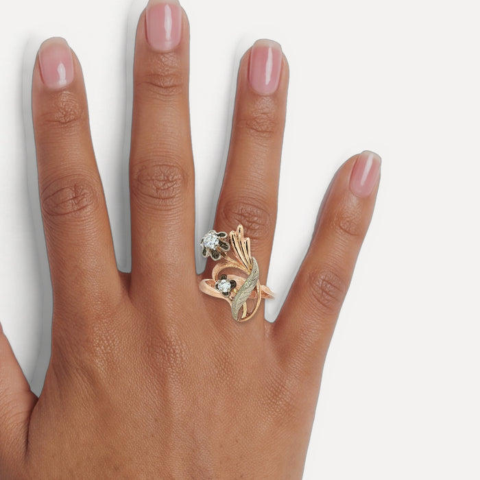 Vintage 1940s Floral Diamond Cocktail Ring (¼ ct.) in 14k Rose Gold & White Gold shown on a hand (medium deep skin tone)