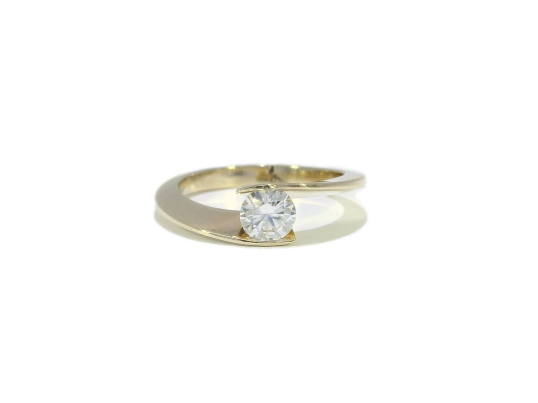 0.55 CTW Colorless VS₁ Natural Round Brilliant Diamond Ring in Yellow Gold