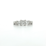 Certified Colorless Three-Stone Diamond Engagement Ring (1 ⅒ ct.) in Platinum