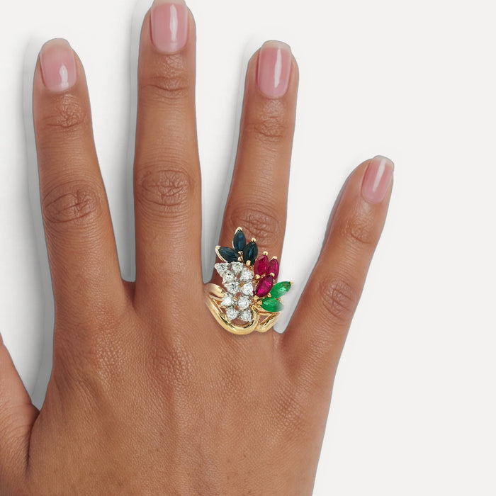 Birds of Paradise Diamond, Ruby, Sapphire & Emerald Ring (3 ⅒ ct. tw.) in 14k Yellow Gold shown on a hand (medium deep skin tone)