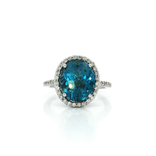 Oval-Shaped Deep London Blue Topaz & Colorless Diamond Halo Ring (7 ¼ ct. tw.) in 14k White Gold