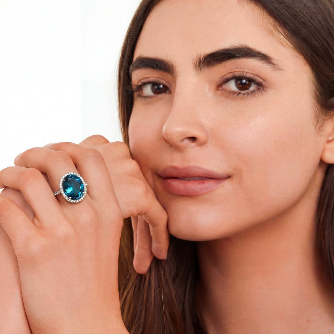 7.25 CTW East - West AAAA Grade Oval Cut Natural London Blue Topaz & Natural Round Brilliant Cut Colorless Diamonds in a Halo Ring in 14kt White Gold – Jewelry Depot, Inc.