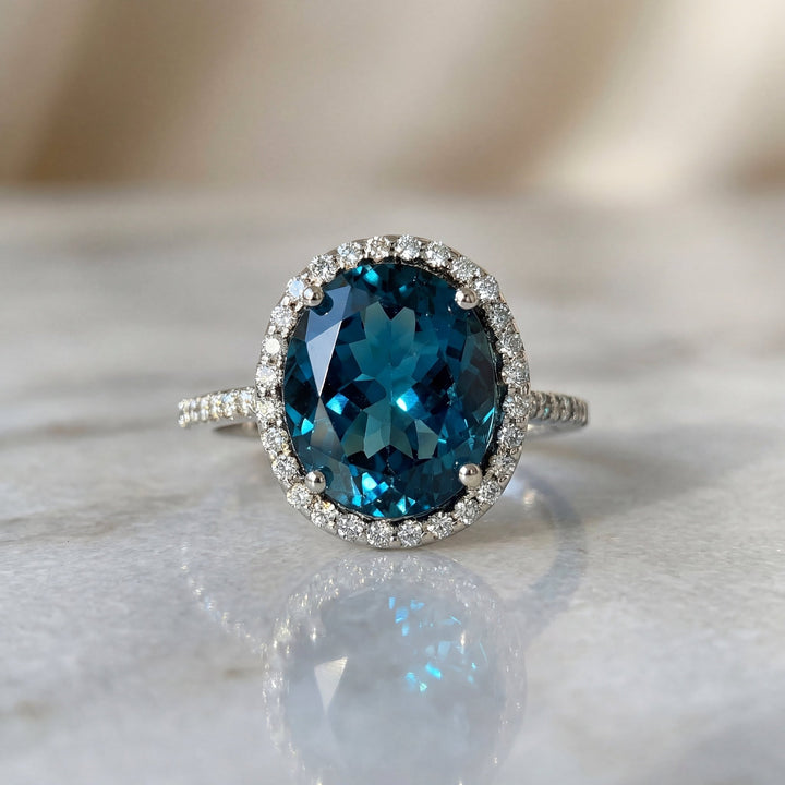 7.25 CTW East - West AAAA Grade Oval Cut Natural London Blue Topaz & Natural Round Brilliant Cut Colorless Diamonds in a Halo Ring in 14kt White Gold – Jewelry Depot, Inc.