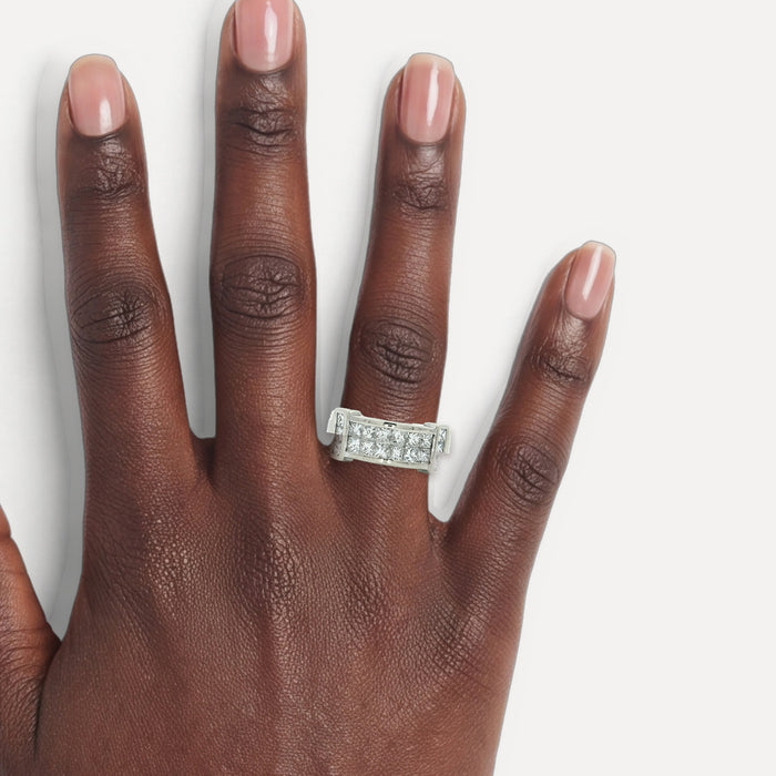 Nearly Flawless Colorless Invisibly-Set Princess Cut Diamond Multi-Band Ring (2 ½ ct. tw.) in 18k White & Yellow Gold shown on a hand (deep skin tone)