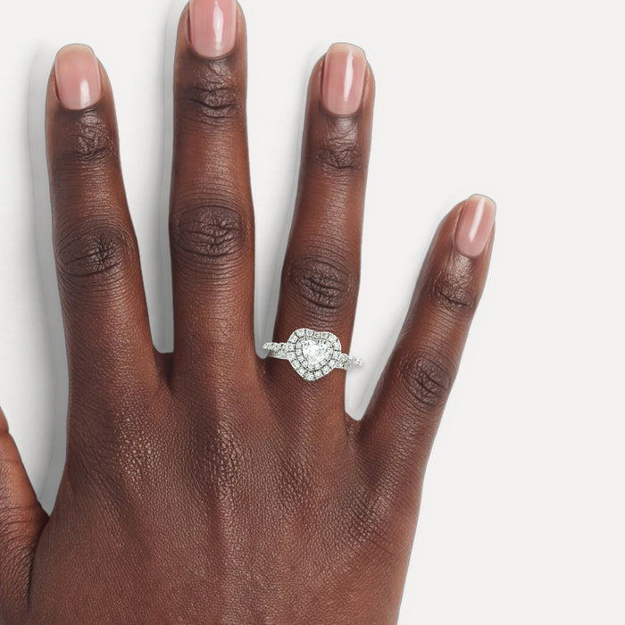 Heart & Round Brilliant Cut Diamond Ring (1 ¾ ct. tw.) with a Double Halo in 14k White Gold shown on a hand (deep skin tone)