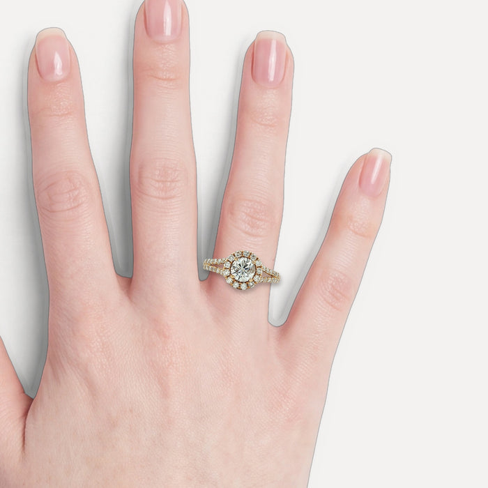 Colorless Diamond Split-Shank Halo Ring (1 ⅗ ct. tw.) in 14k Yellow Gold shown on a hand (light skin tone)