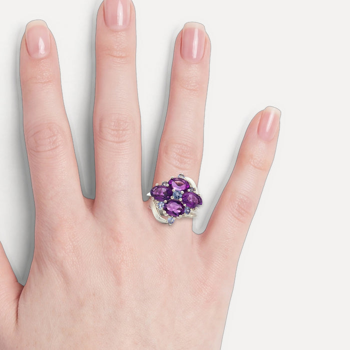 Purple & Sky Blue Split Shank CZ Ring in Sterling Silver shown on a hand (light skin tone)