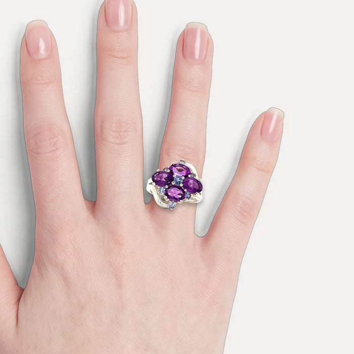 Purple & Sky Blue Split Shank CZ Ring in Sterling Silver shown on a hand (light skin tone)